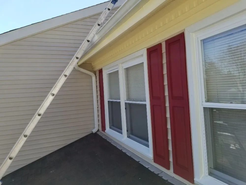 Slide of German Fuentes Gutter Cleaning