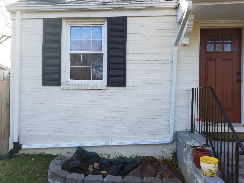 Slide of German Fuentes Gutter Cleaning