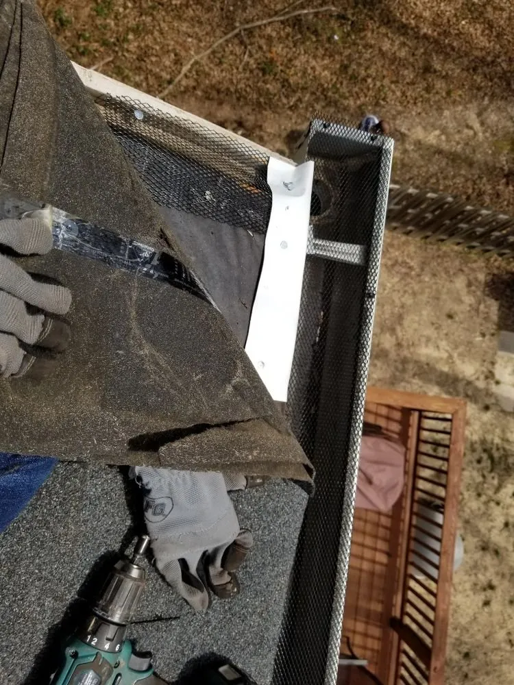 Slide of German Fuentes Gutter Cleaning