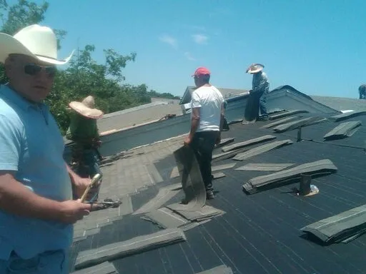 Slide of Get Er Done Roofing
