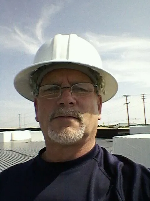 Slide of Get Er Done Roofing