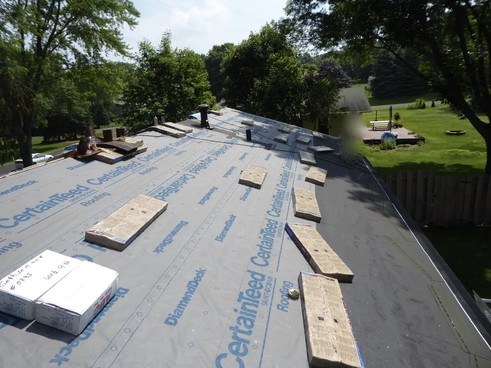 Emergency roof installation after storm damage in Mc Farland, WI by Gethsemane Roofing