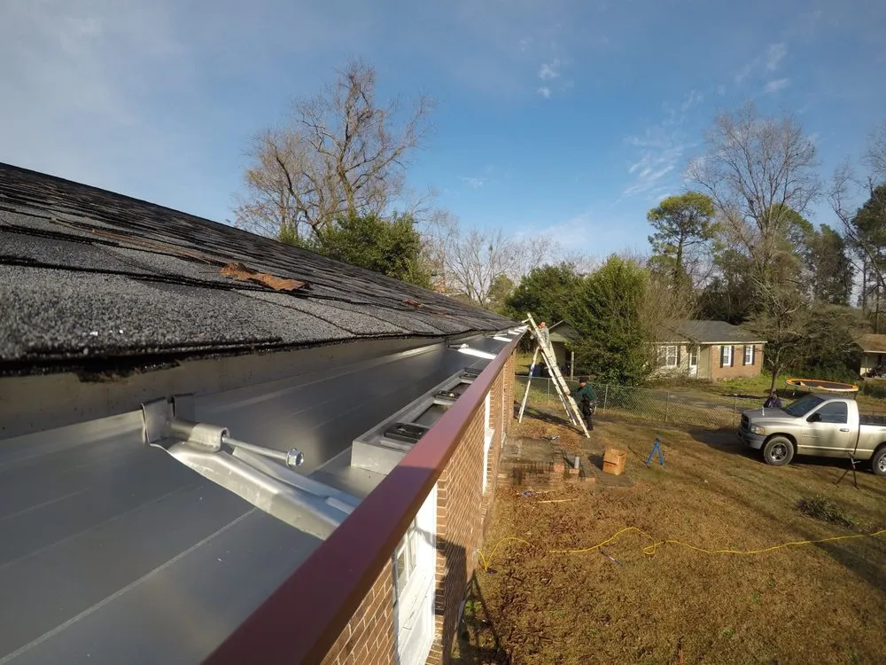 Slide of GGA Roofing & Gutters