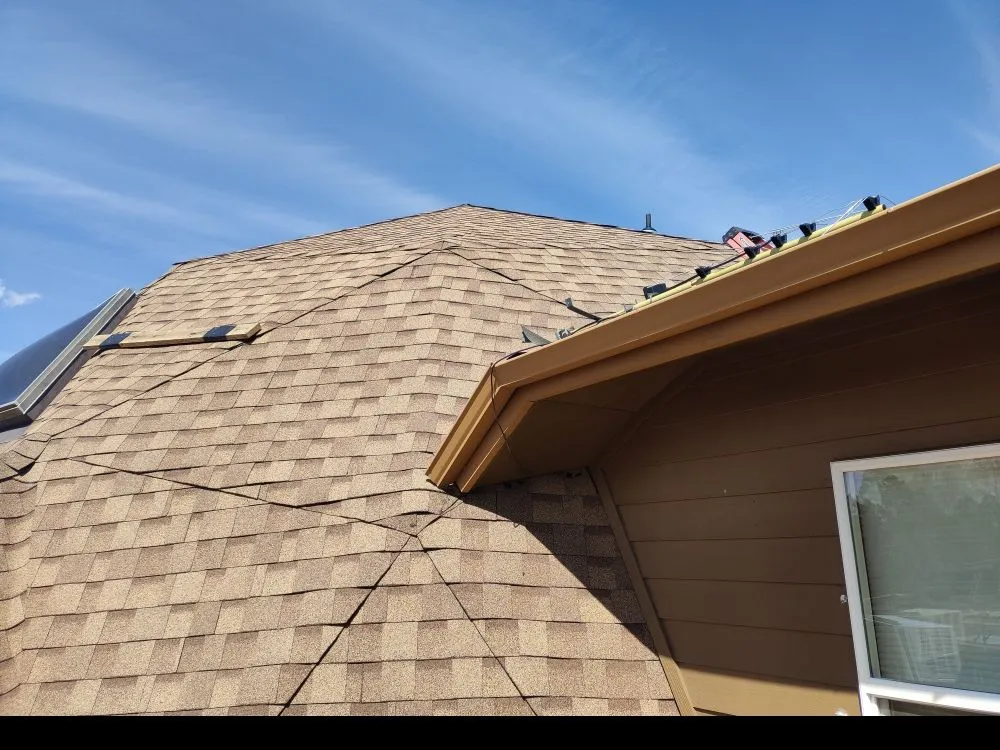 Slide of Gibs Roofing