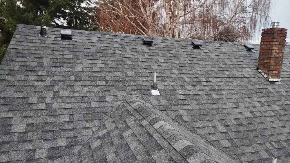 Slide of Gibs Roofing