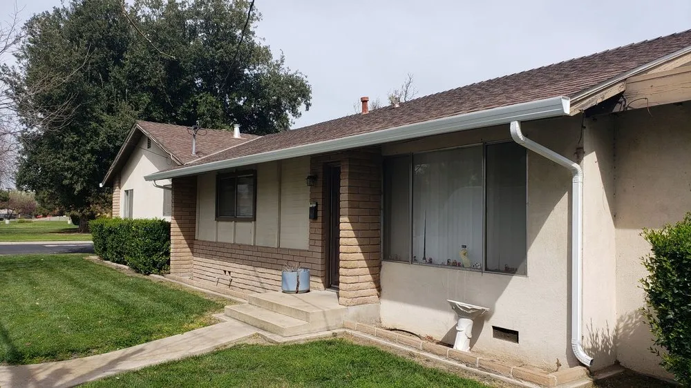 Slide of Gibson Rain Gutters