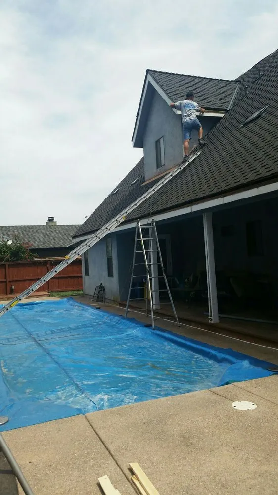 Slide of Gibson Rain Gutters