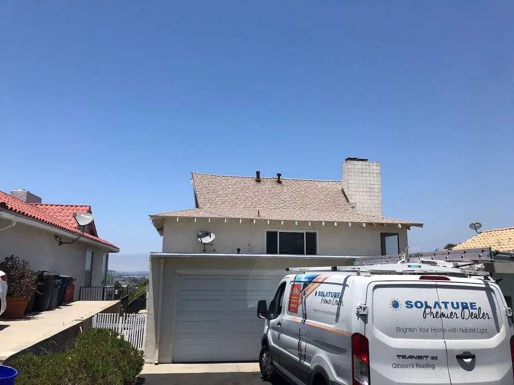 Slide of Gibson's Roofing