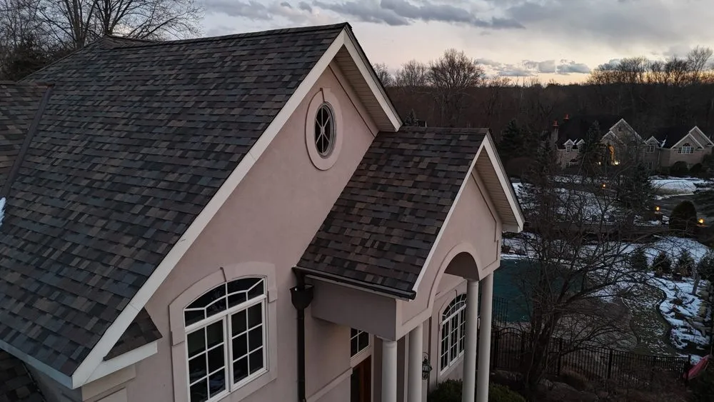 Slide of Gikas Roofing