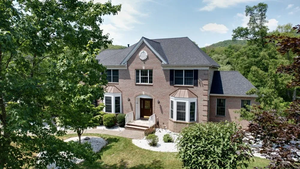 Slide of Gikas Roofing