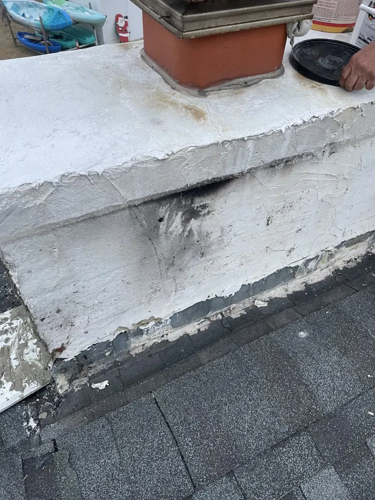 Slide of Gil Gutters and Roofing