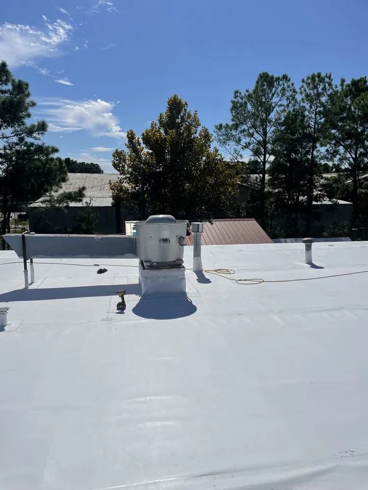 Slide of Gil Gutters and Roofing