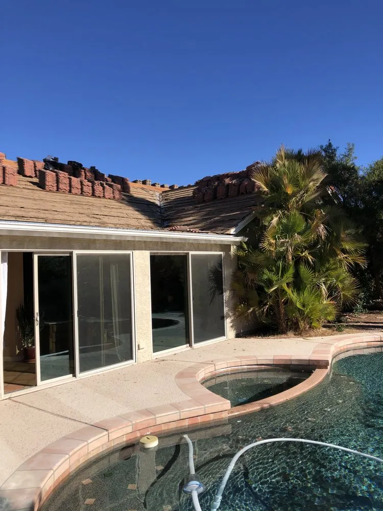 Slide of Gilbert Roofing