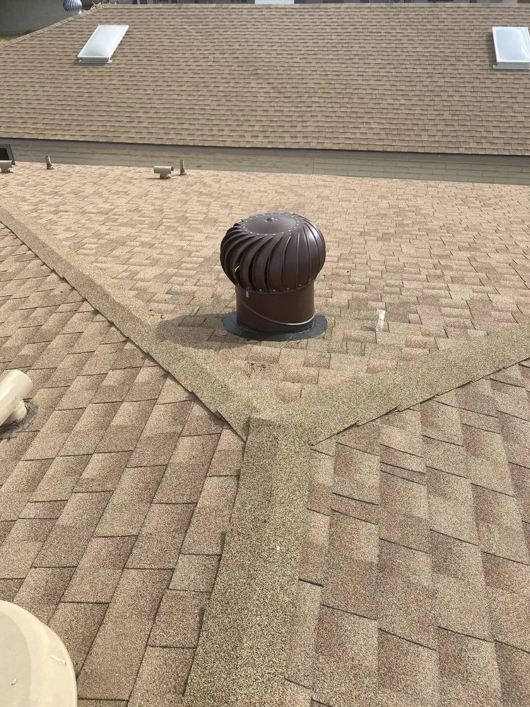 Slide of Gilbert Roofing