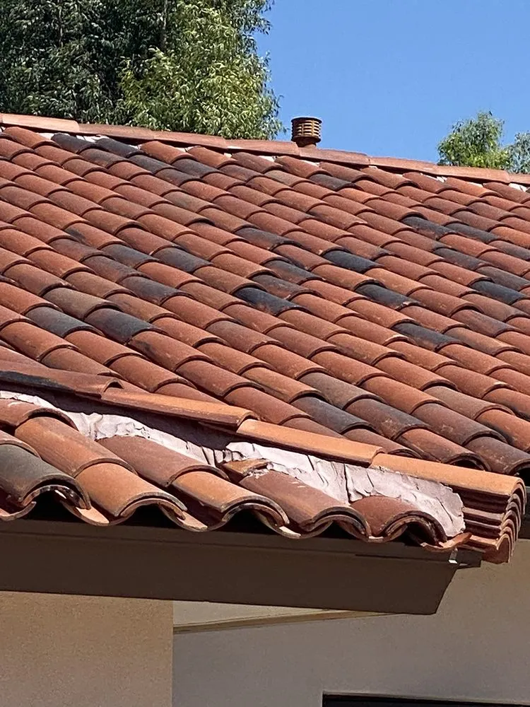 Slide of Gilbert Roofing