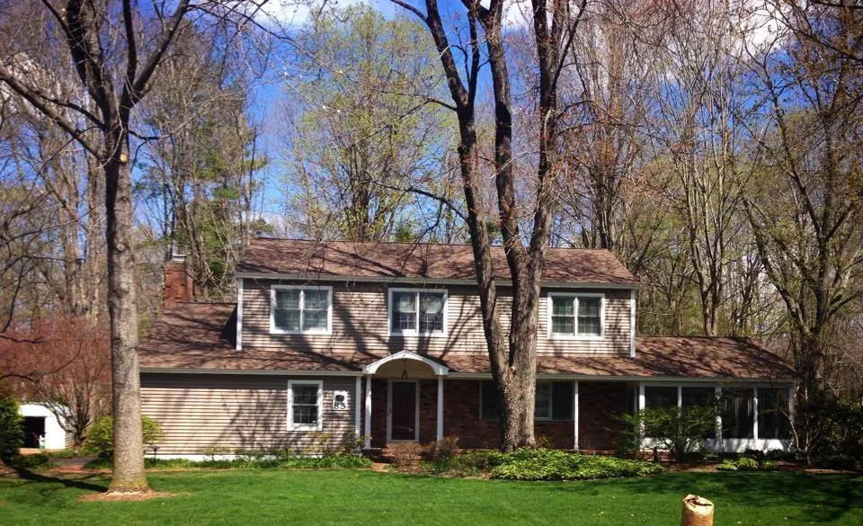 Expert roof inspection after storm damage in Slingerlands, NY by Giles Construction