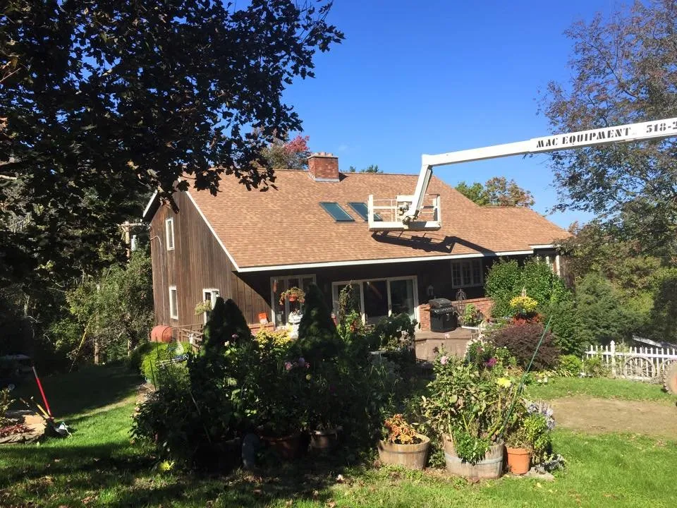 Emergency roof installation for fast service in Slingerlands, NY by Giles Construction