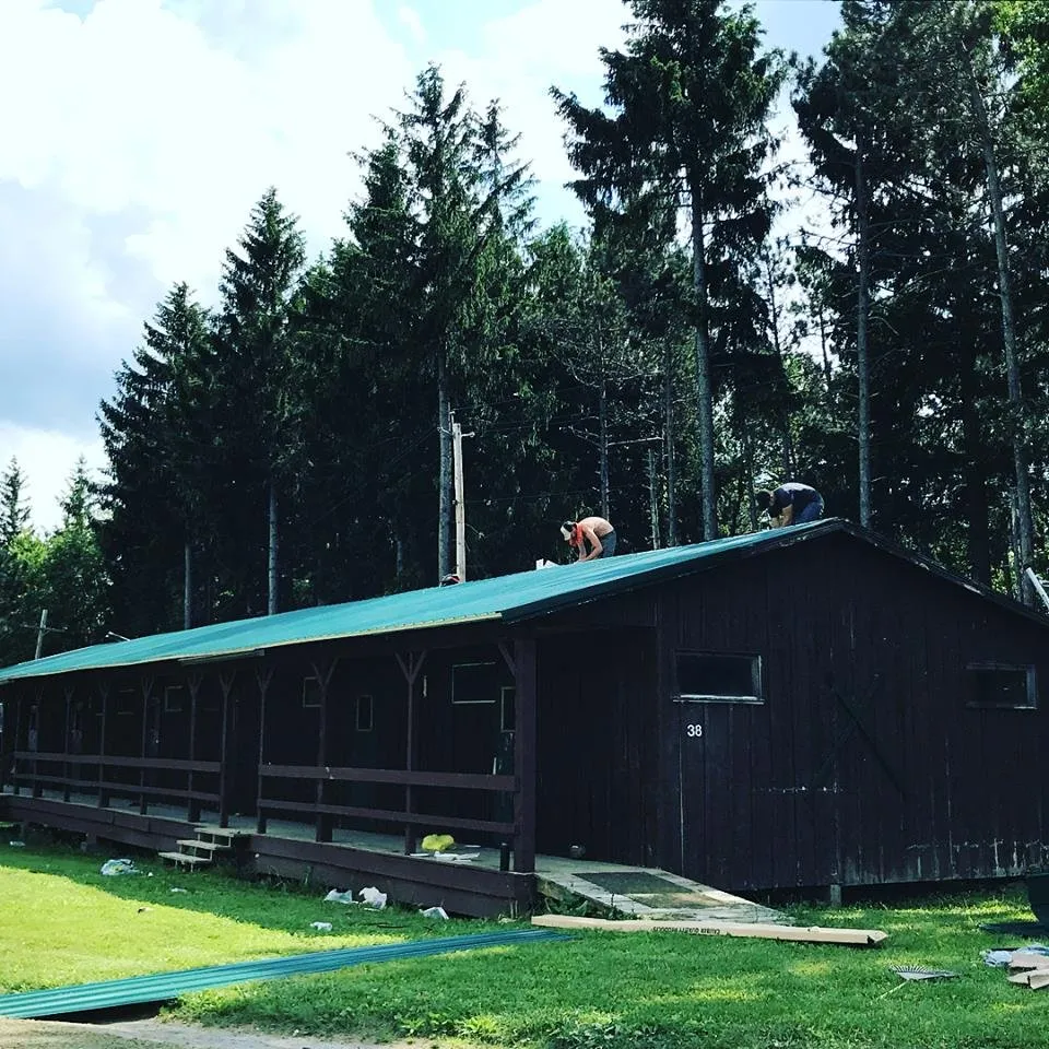 Local flat roof repair in Slingerlands, NY by Giles Construction