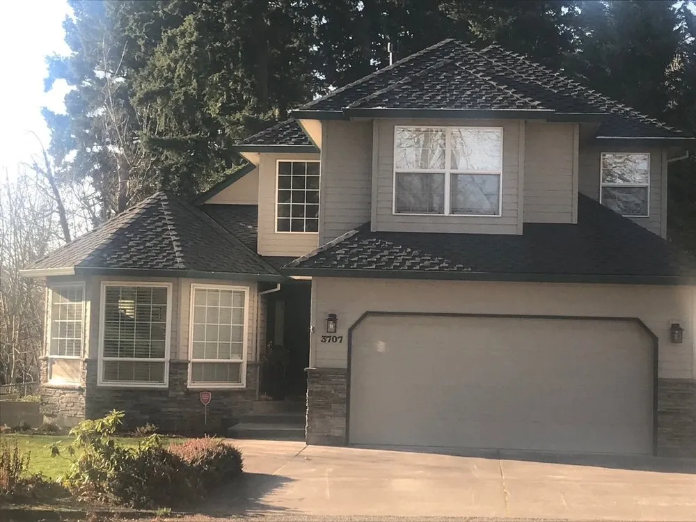 Slide of Giron Roofing