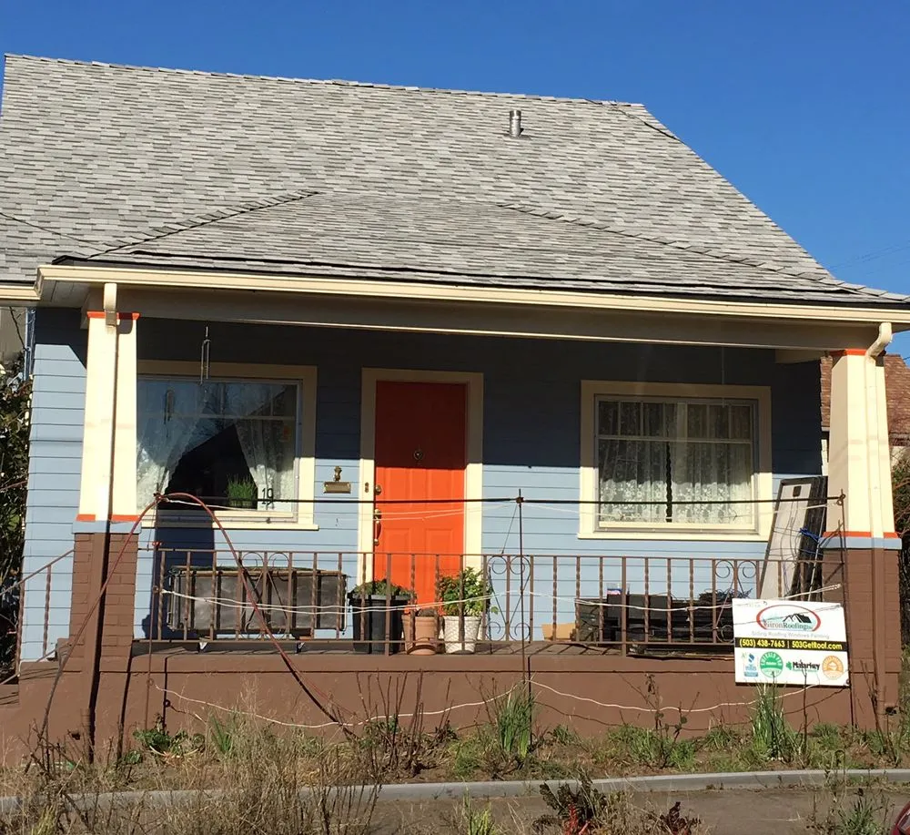 Slide of Giron Roofing