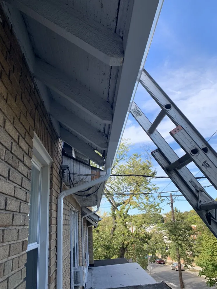 Slide of G&J Roofing Services