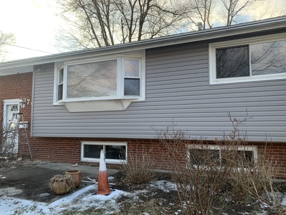 Slide of G&J Roofing Services