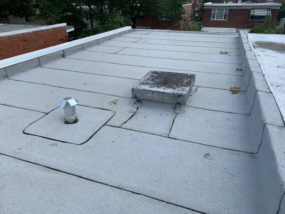 Slide of G&J Roofing Services