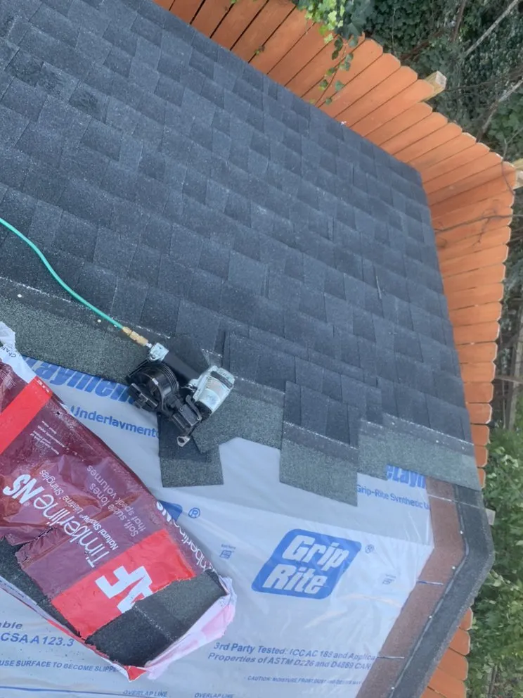 Slide of G&J Roofing Services