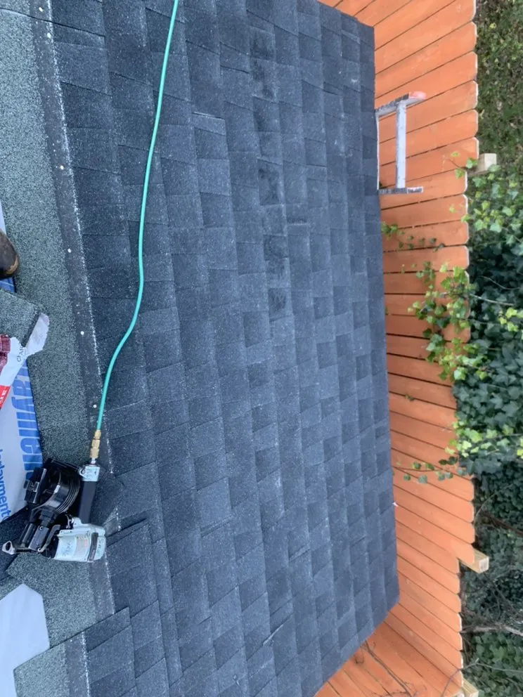 Slide of G&J Roofing Services