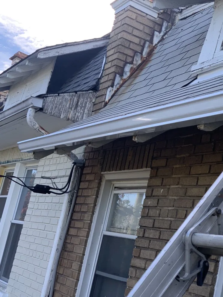 Slide of G&J Roofing Services