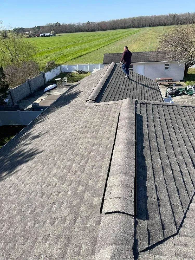 Trusted storm damage roof repair in Ottsville, PA by G&K Gutters & Roofing