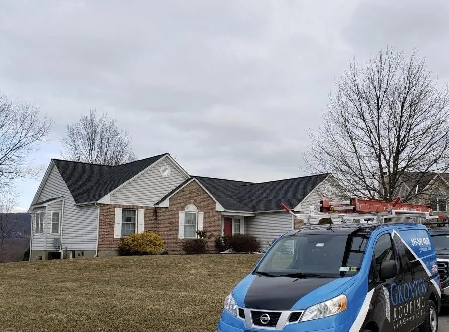 Slide of GKontos Roofing Specialists