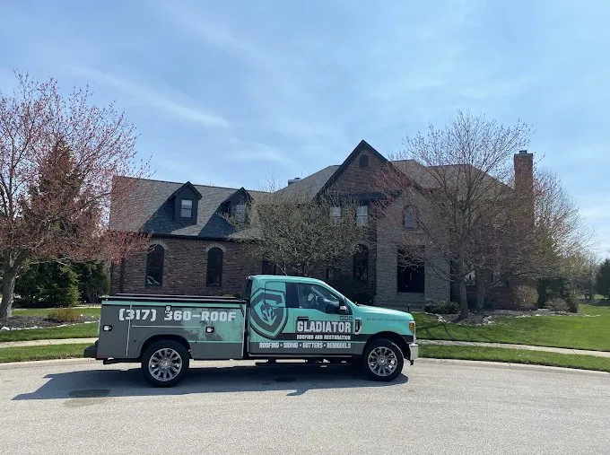 Slide of Gladiator Roofing & Restoration