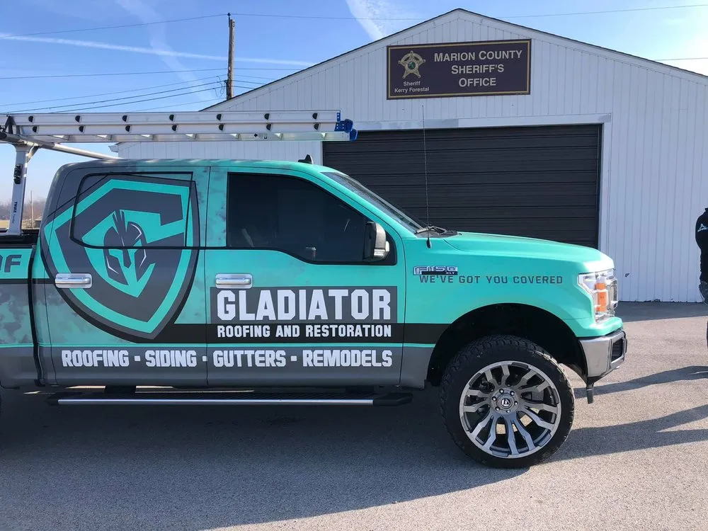 Slide of Gladiator Roofing & Restoration