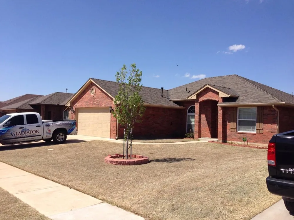 Slide of Gladiator Roofing and Construction