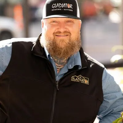 Gladiator Roofing and Guttering Logo