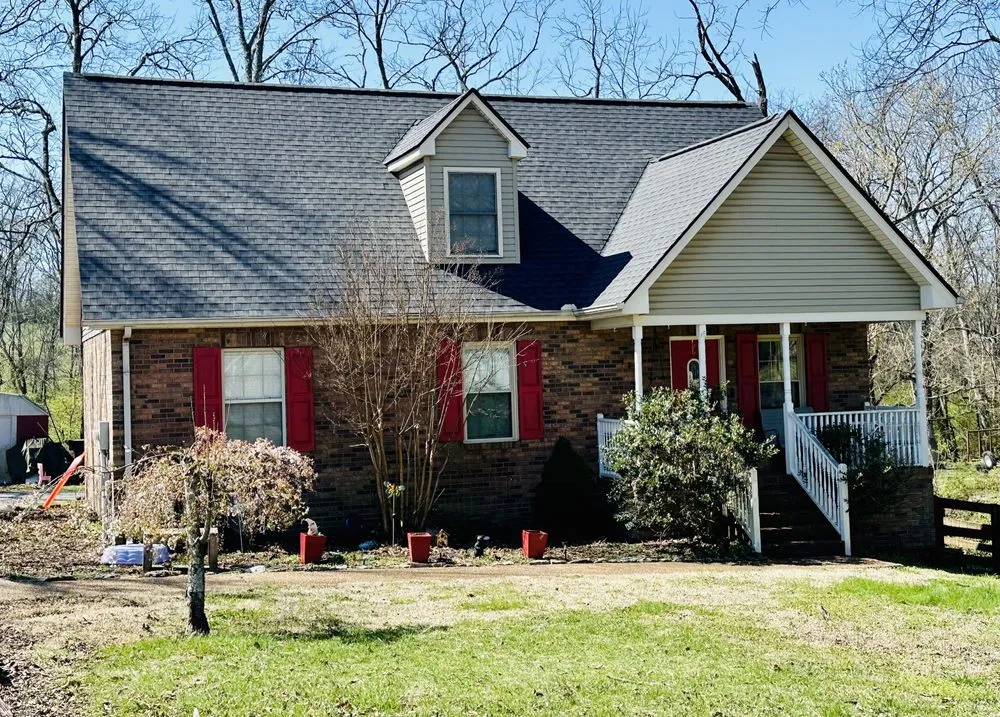 Slide of Gladiator Roofing and More