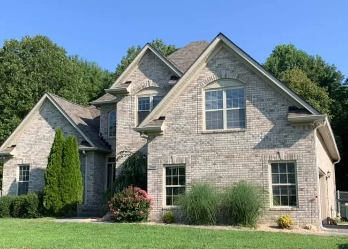 Slide of Gladiator Roofing and More