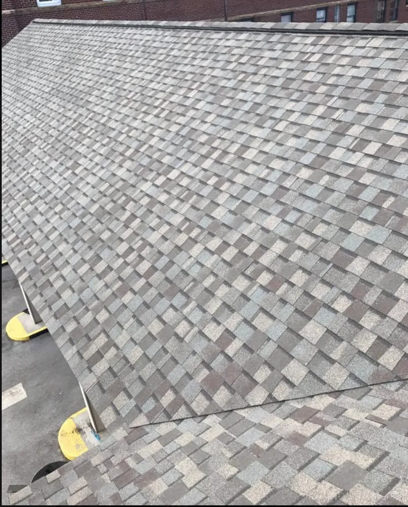 Slide of Gladiator Roofing and More