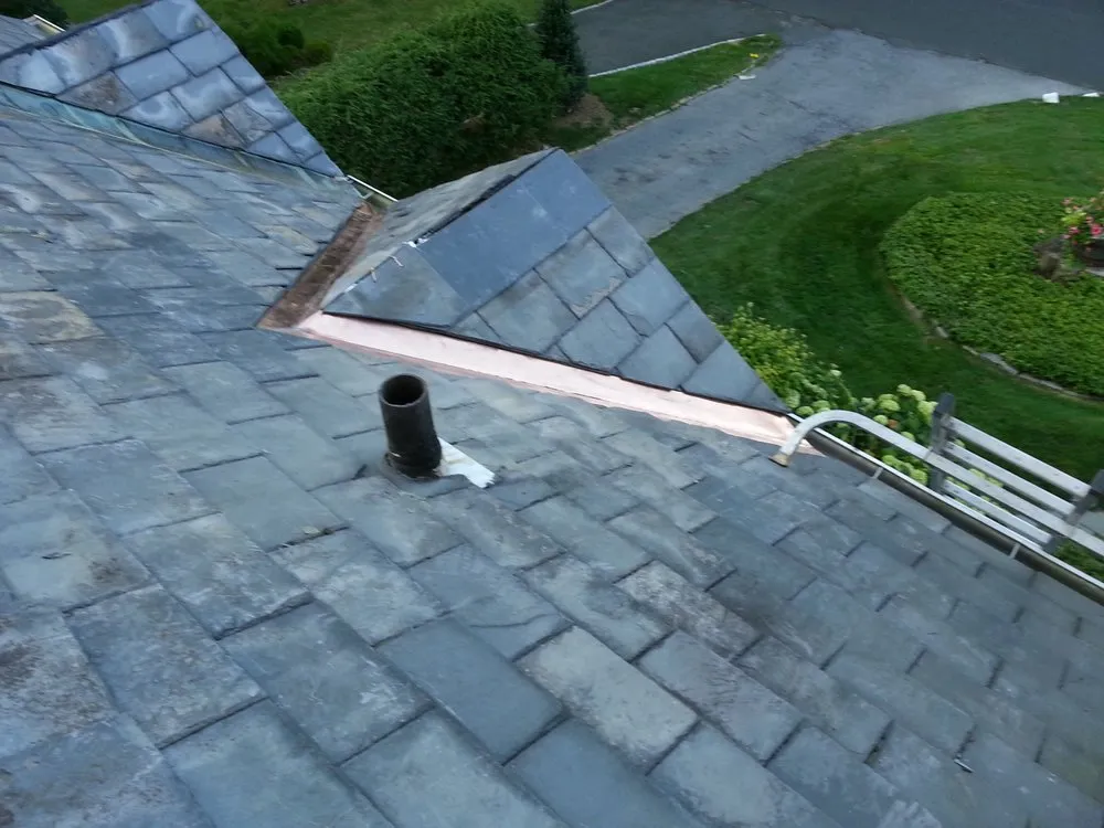 Slide of Glen Roofing Corporation