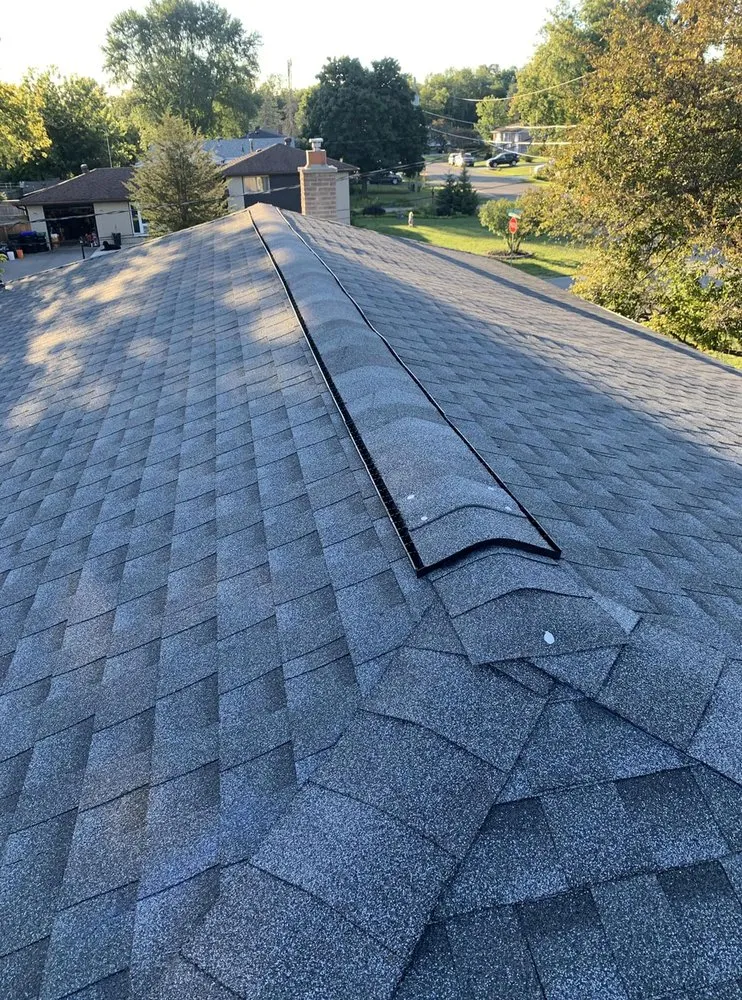 Slide of Glenville Roofing