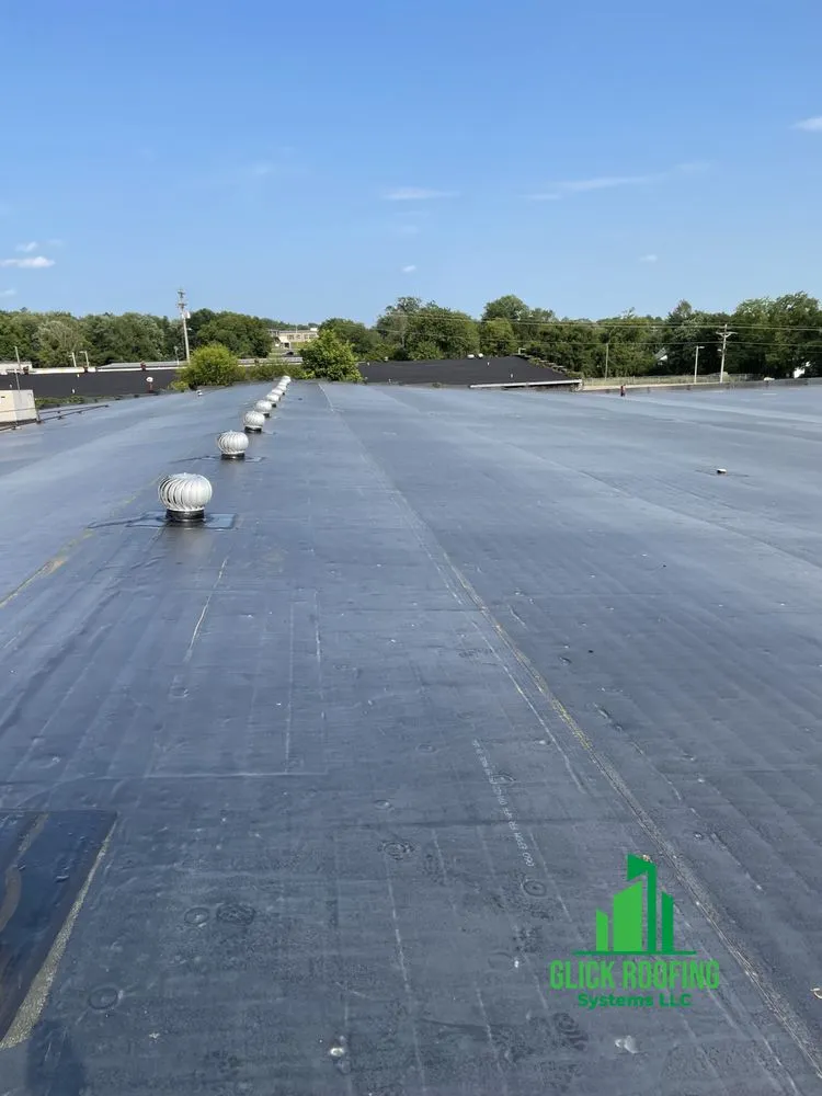 Slide of Glick Roofing Systems