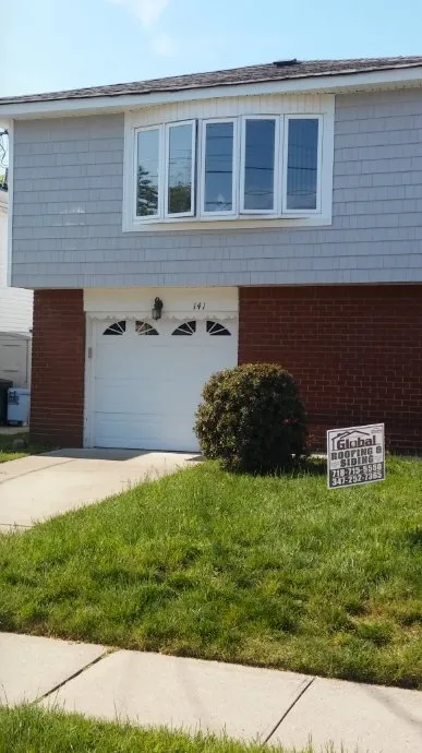 Slide of Global Roofing and Siding