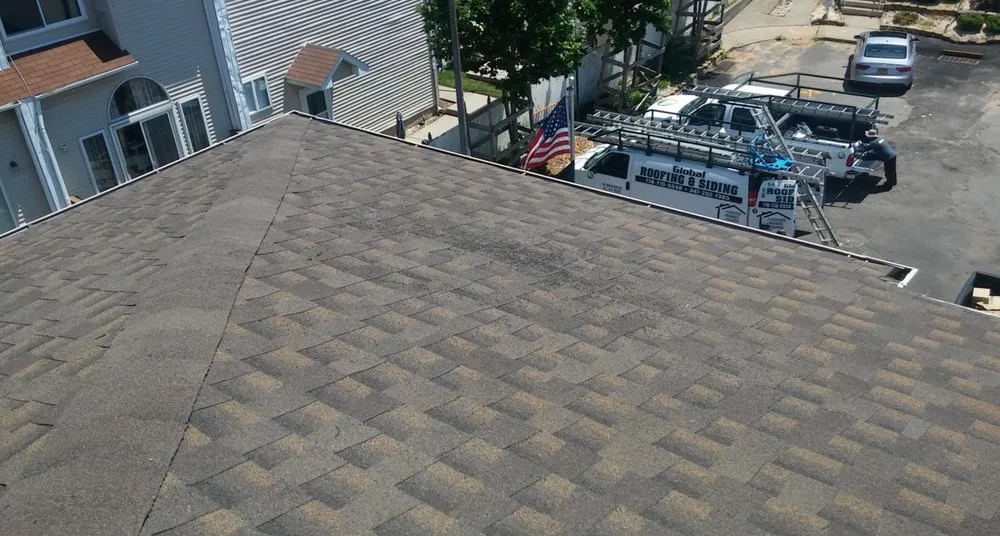 Slide of Global Roofing and Siding