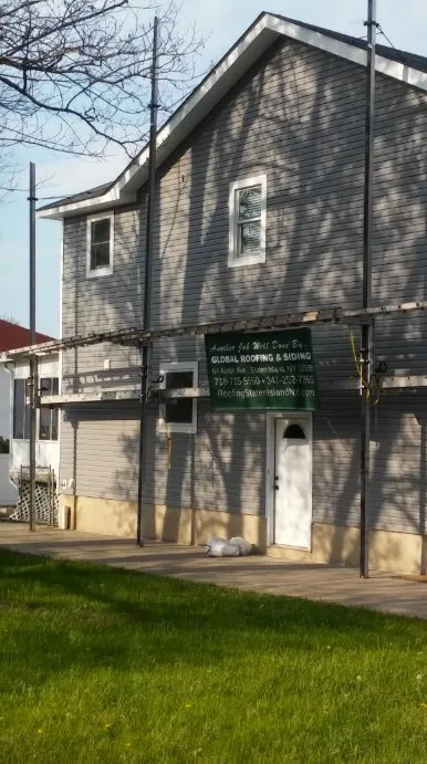 Slide of Global Roofing and Siding