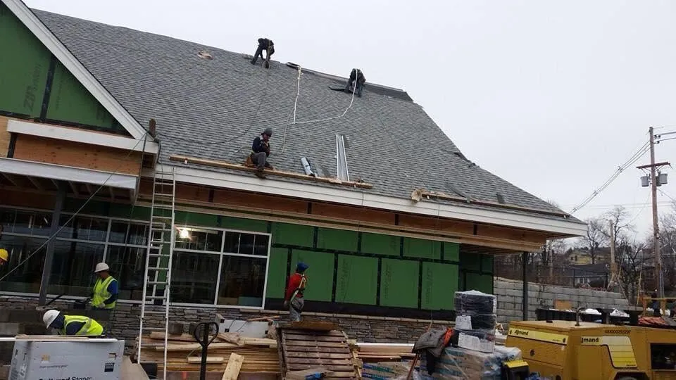 Slide of Global Roofing