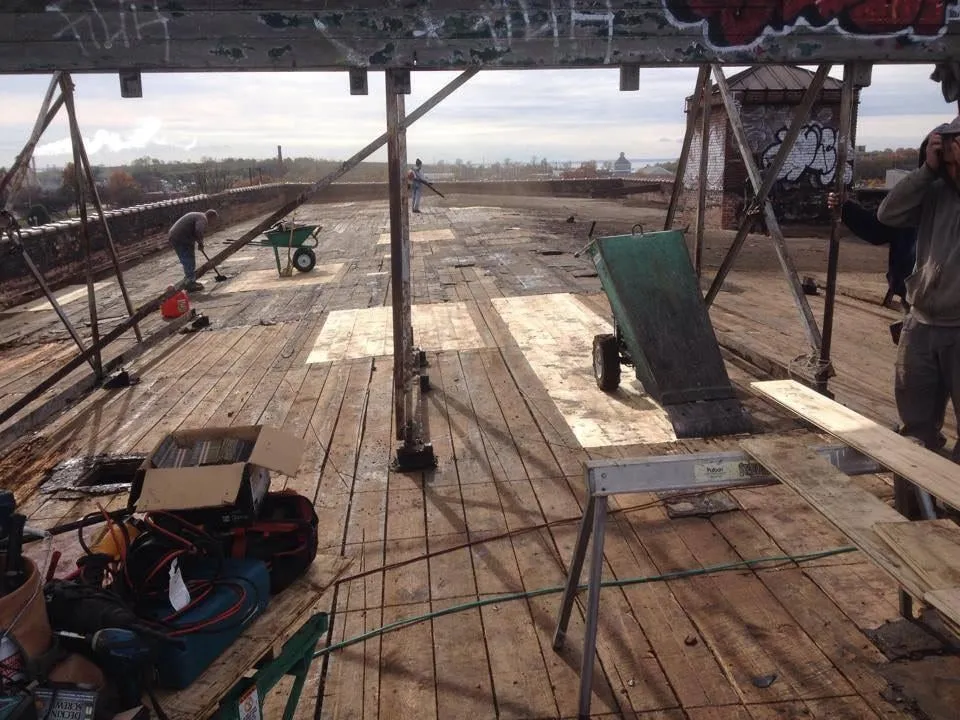 Slide of Global Roofing