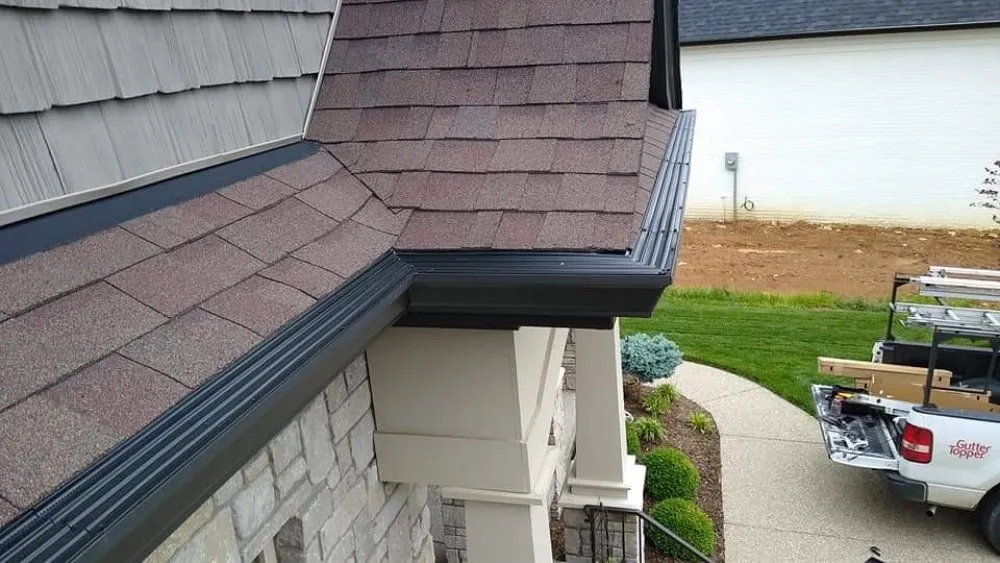 Slide of G/M Roofing & Gutter Topper