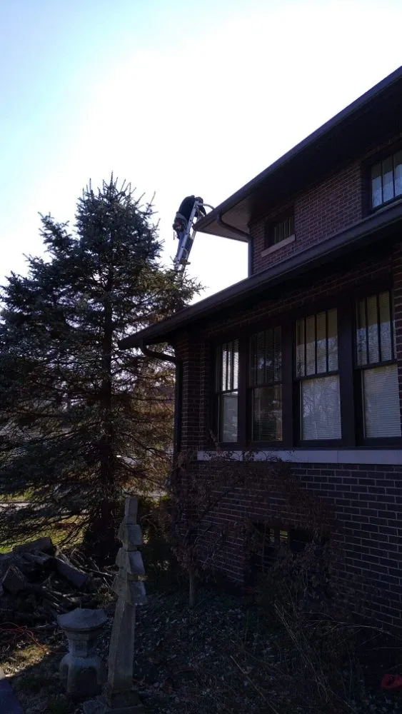 Slide of G/M Roofing & Gutter Topper