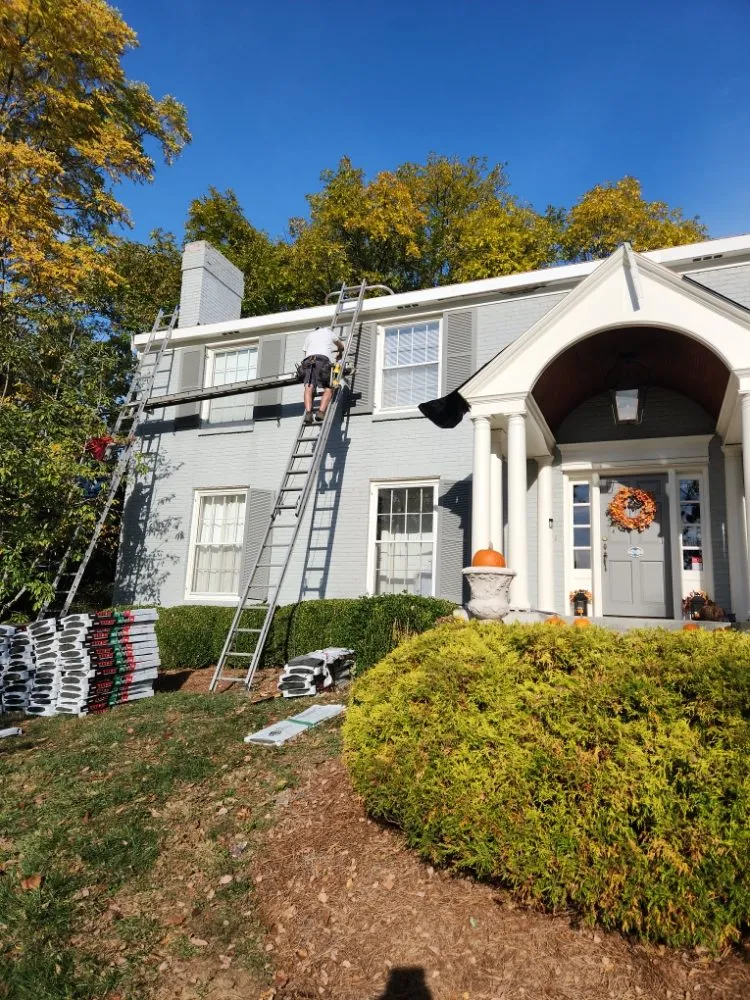 Slide of G/M Roofing & Gutter Topper